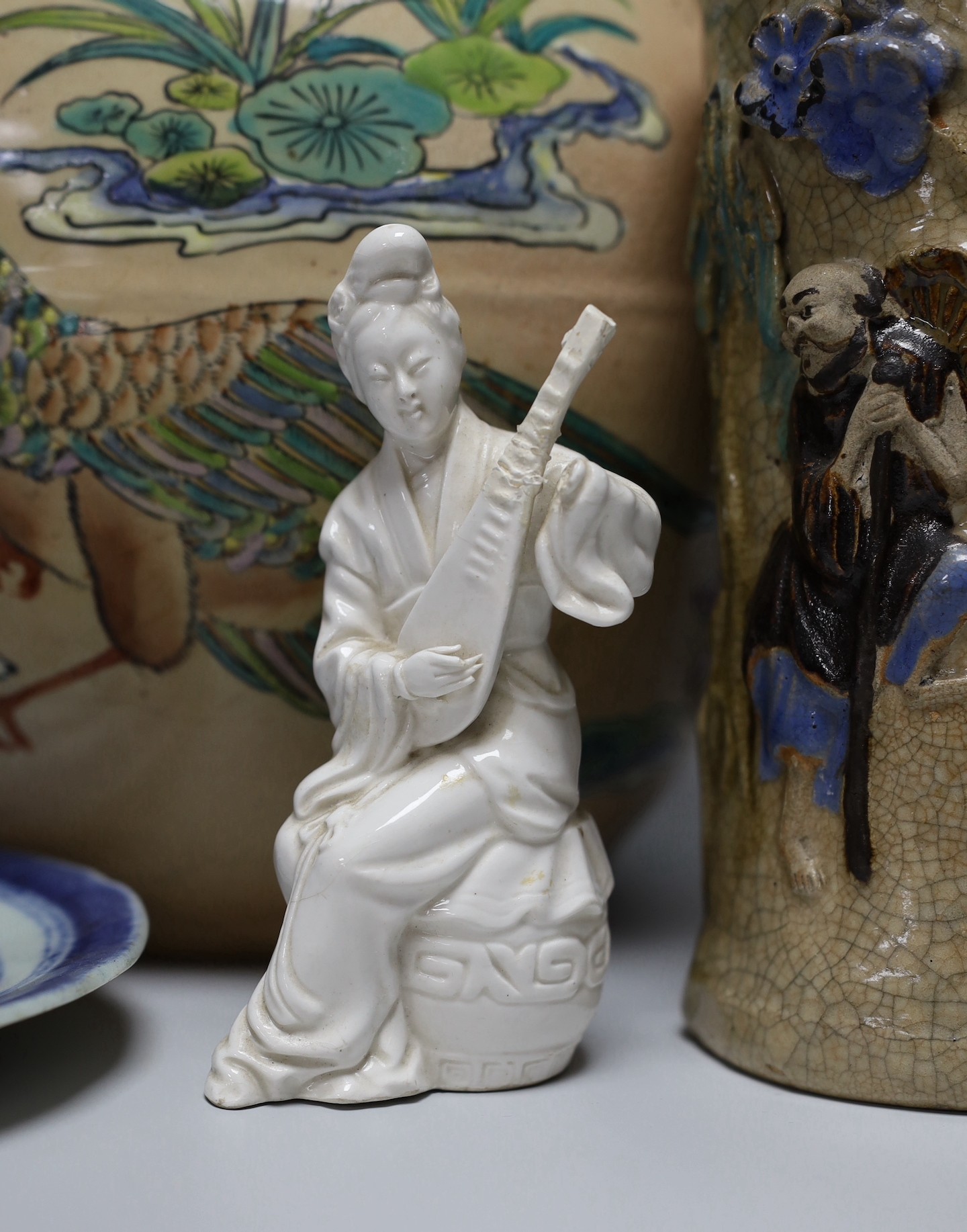 A Chinese blue and white gu vase, a baluster vase, a dish etc.